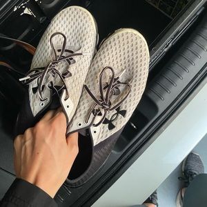 Men’s black and white underarmour shoes